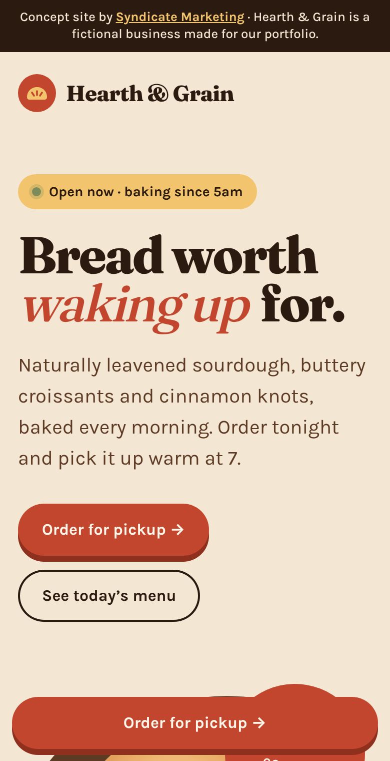 Hearth & Grain concept website on a phone